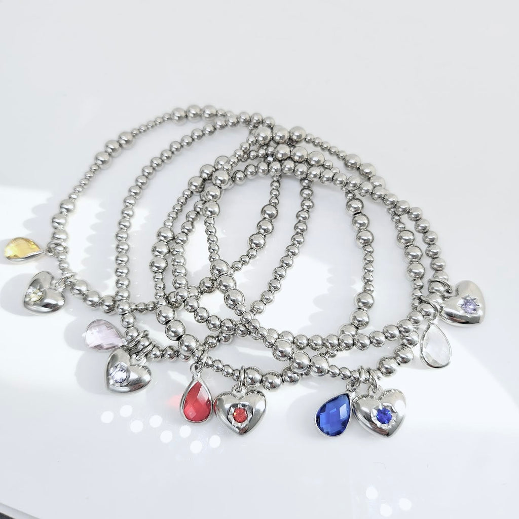 Bracelet élastique 4 mm avec pendentif cœur et goutte de cristal