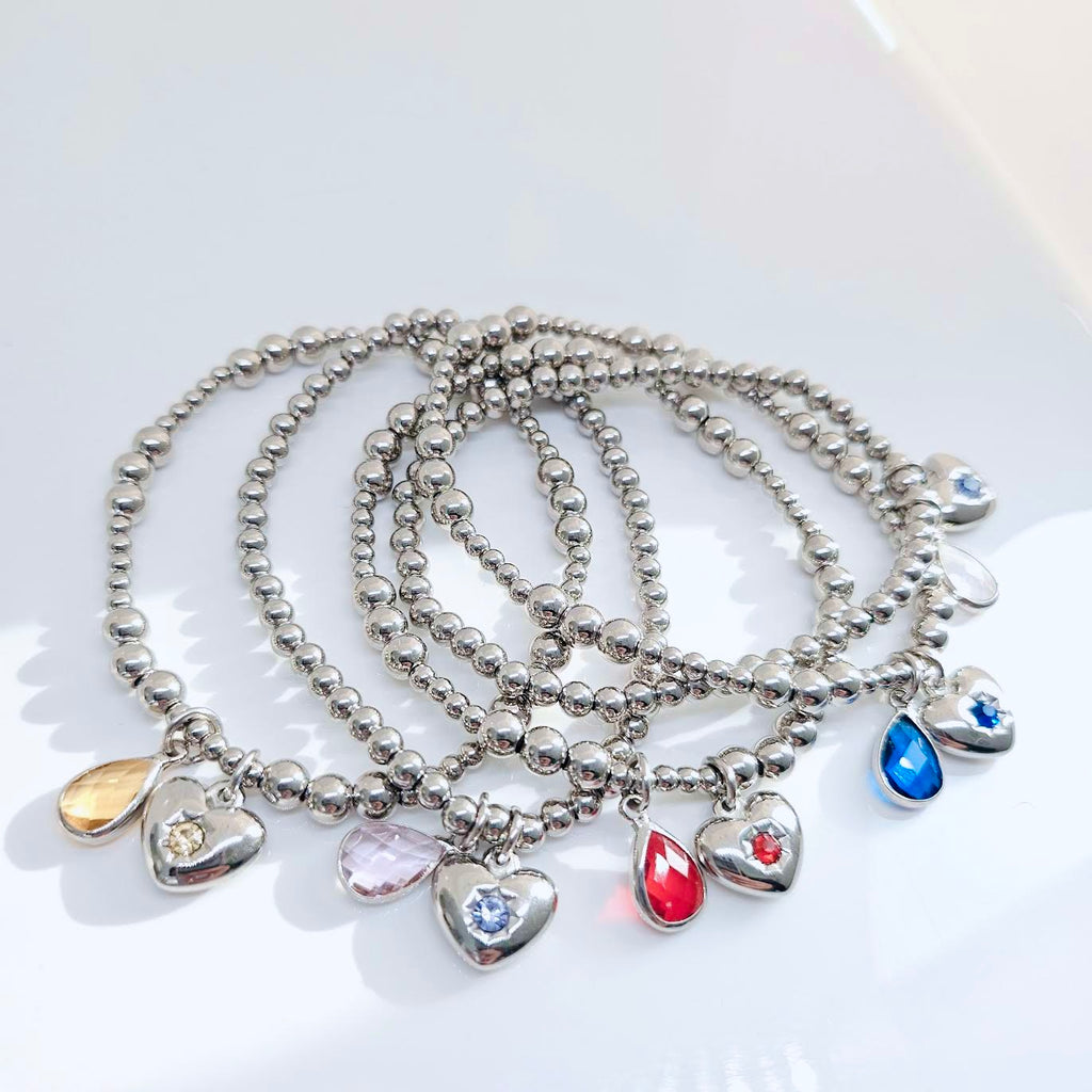 Bracelet élastique 4 mm avec pendentif cœur et goutte de cristal