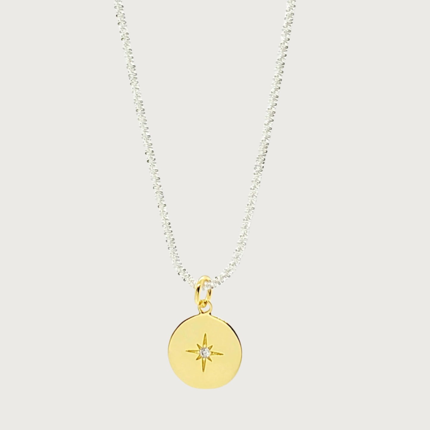 Gold North Star medallion necklace with sterling silver base, elegant pendant on fine chain