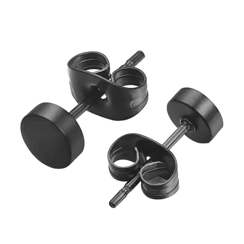 Black stud earrings on a white background