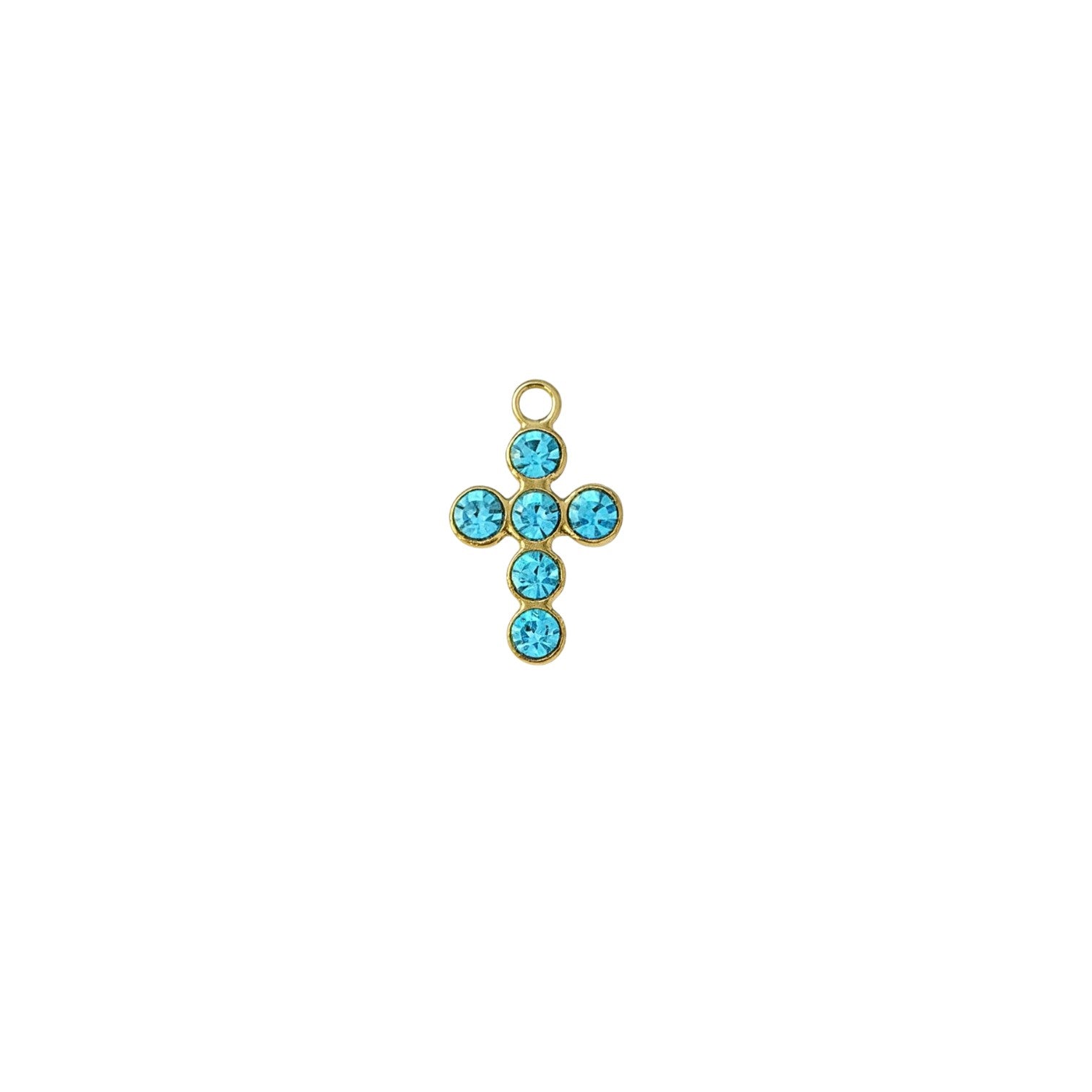 Gold cross pendant with blue gemstones on a white background
