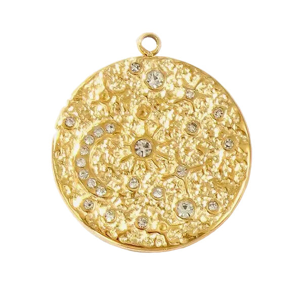 A round gold pendant with a textured floral pattern and small clear rhinestones, shown on a light gray background.