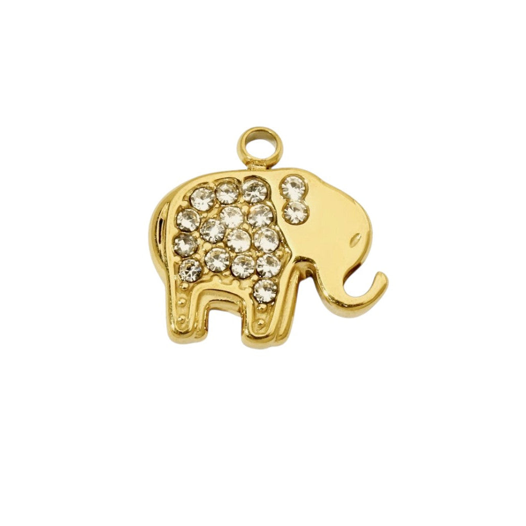 Gold elephant pendant with embedded crystals on a white background