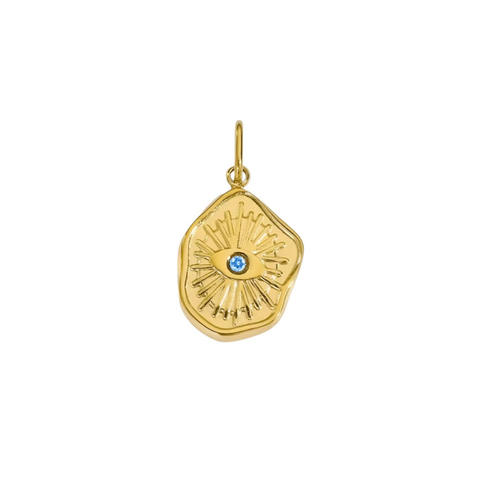 Gold pendant with a blue gemstone on a white background