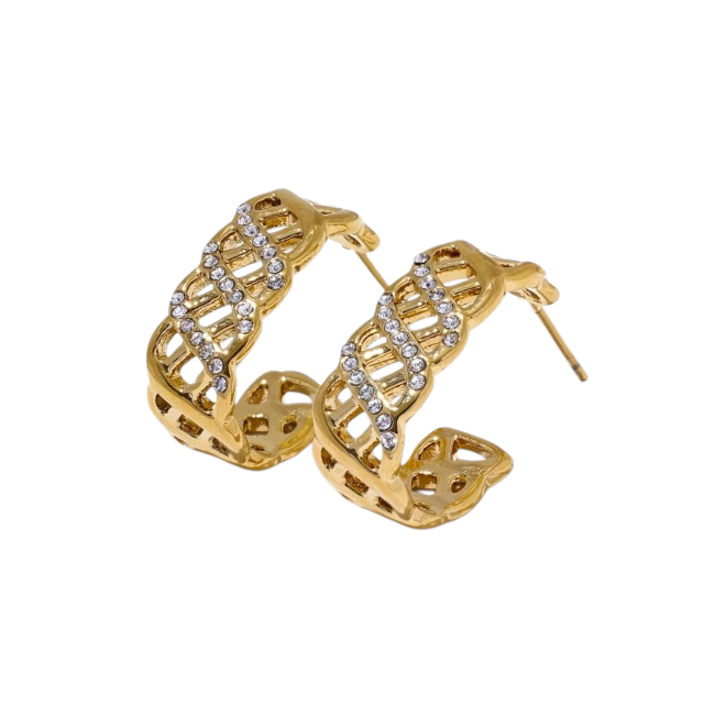 Gold hoop earrings with intricate design on a white background