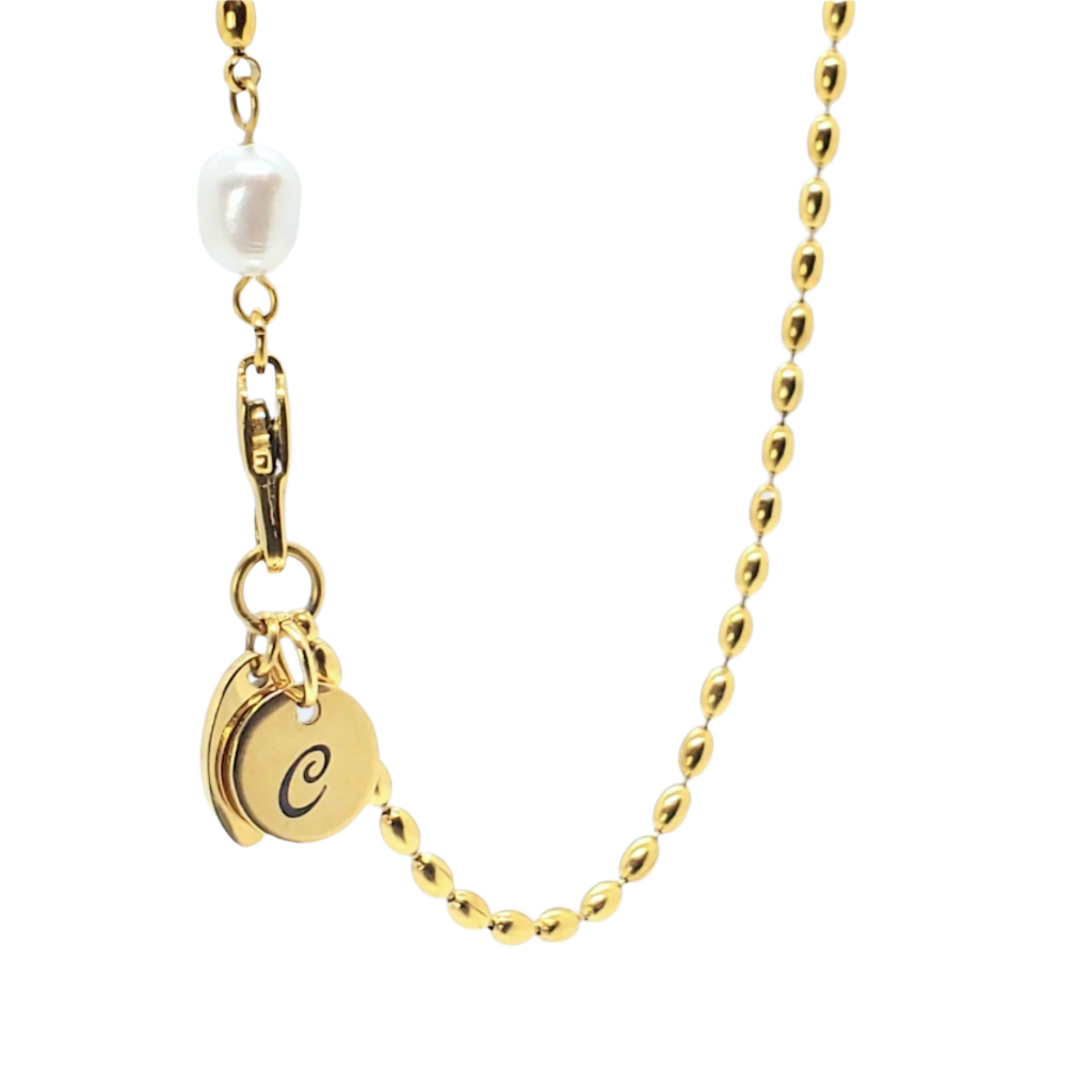 Close-up of personalized mini initial disc necklace with freshwater pearl charm in gold, delicate and elegant for everyday wear.