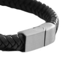 Black braided leather bracelet with a silver clasp on a white background