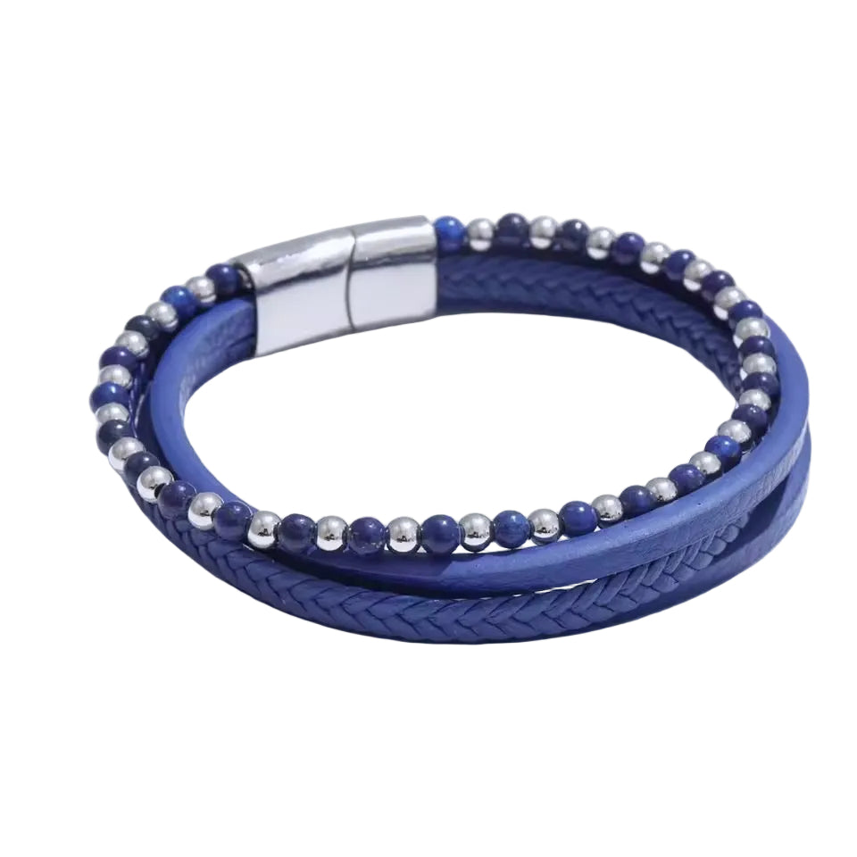 Blue braided bracelet with silver beads on a white background