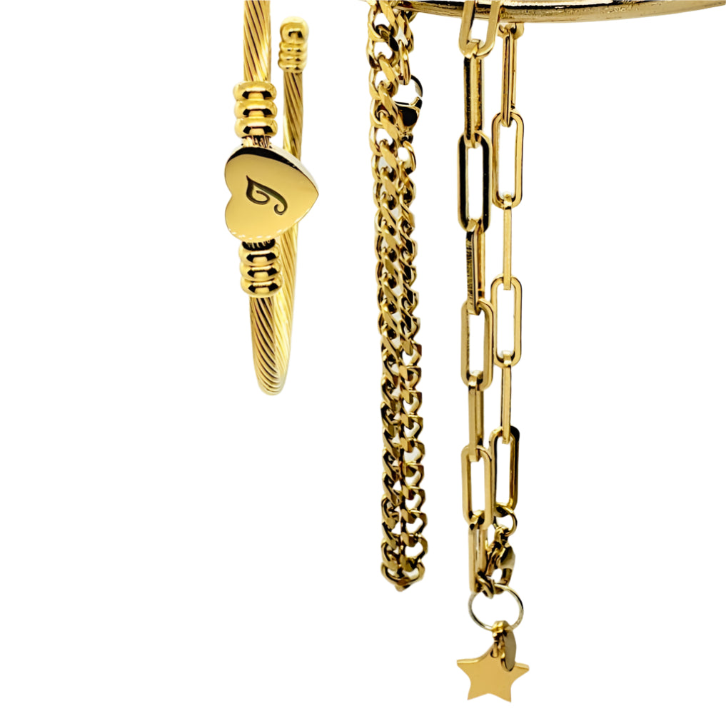 A set of three stainless steel bracelets with different designs, including a chain link, a twisted cable, and a bar with a heart charm.