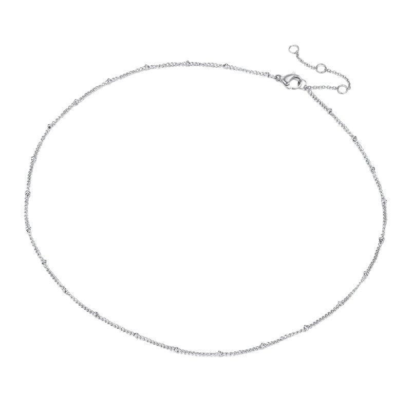 Silver satellite  necklace on a white background