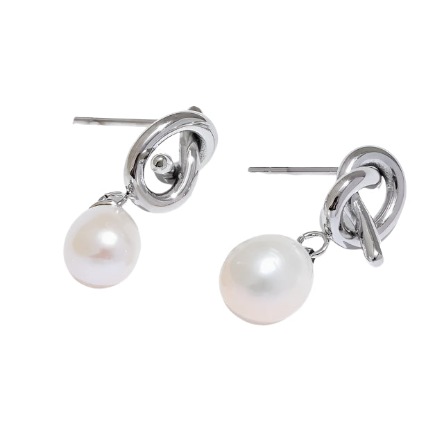 Pearl earrings with silver hooks on a white background