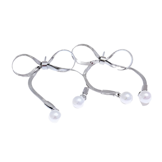 Silver bracelet with pearls on a white background