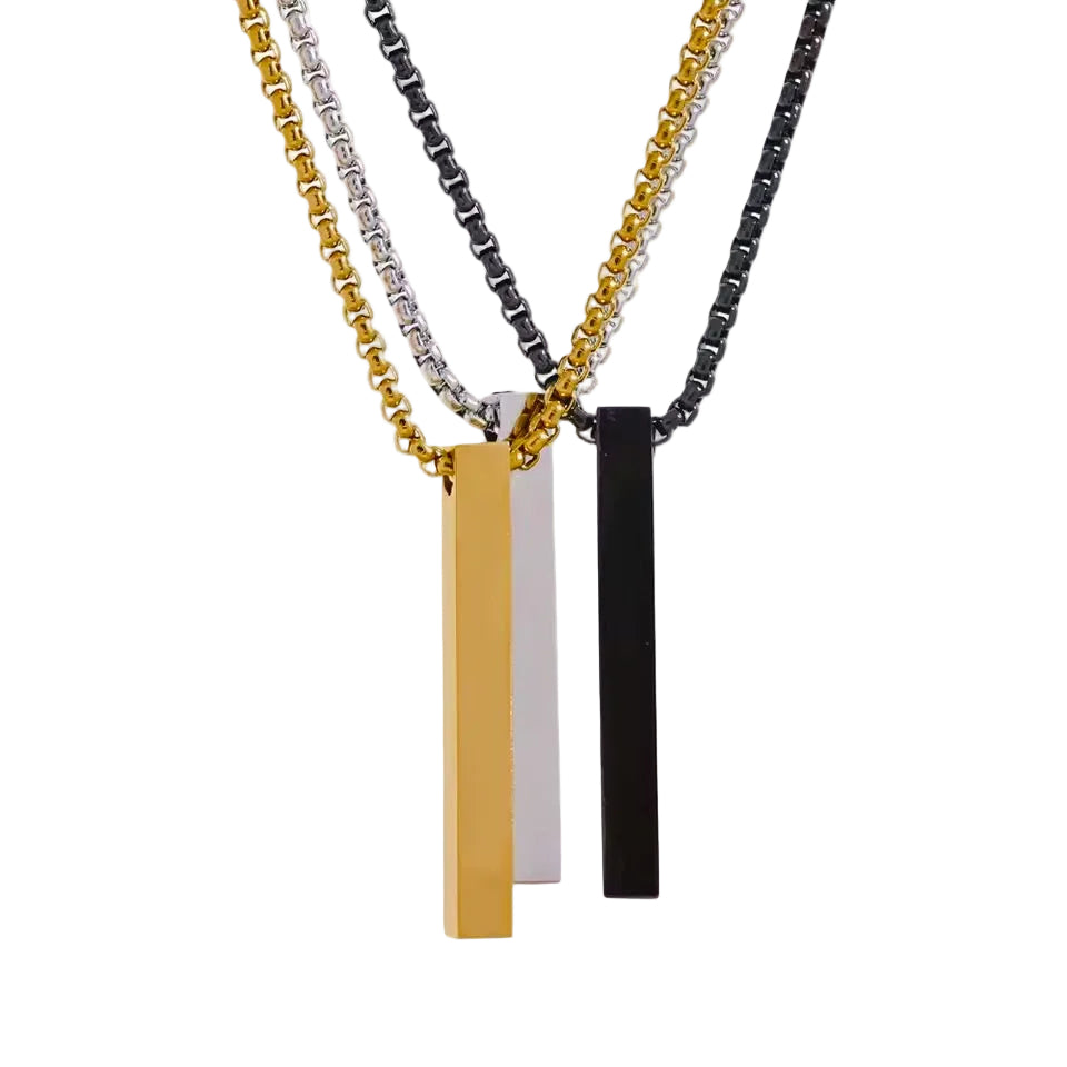 Three necklaces with vertical bar pendants in gold, silver, and black on a white background.