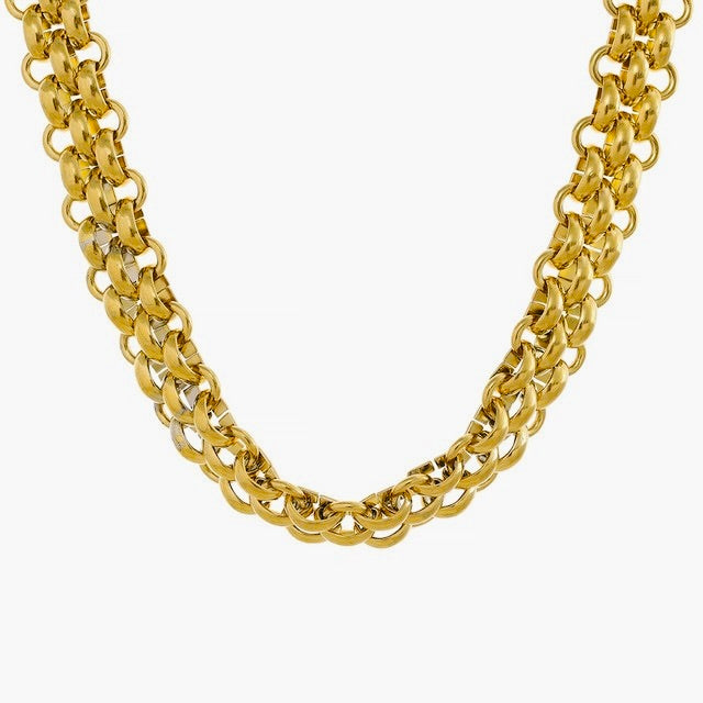 Gold chain necklace on a white background