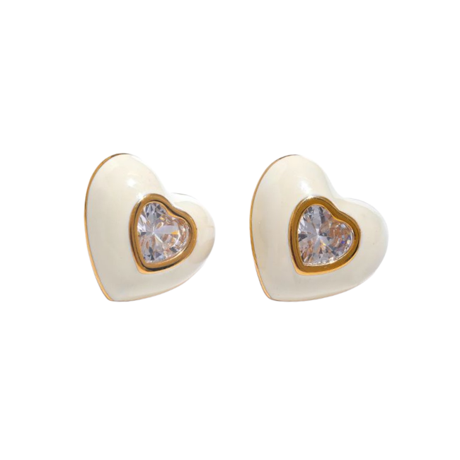 Heart-shaped earrings with a central gemstone on a white background