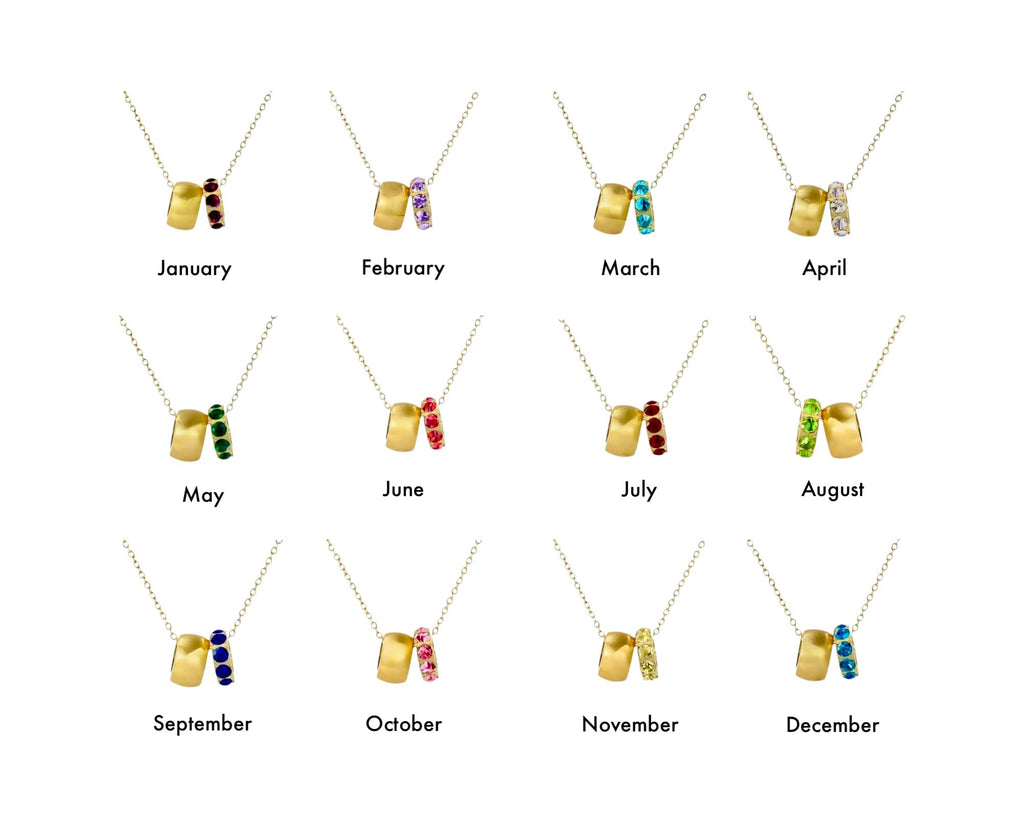 Necklaces with colored stones for each month of the year on a white background