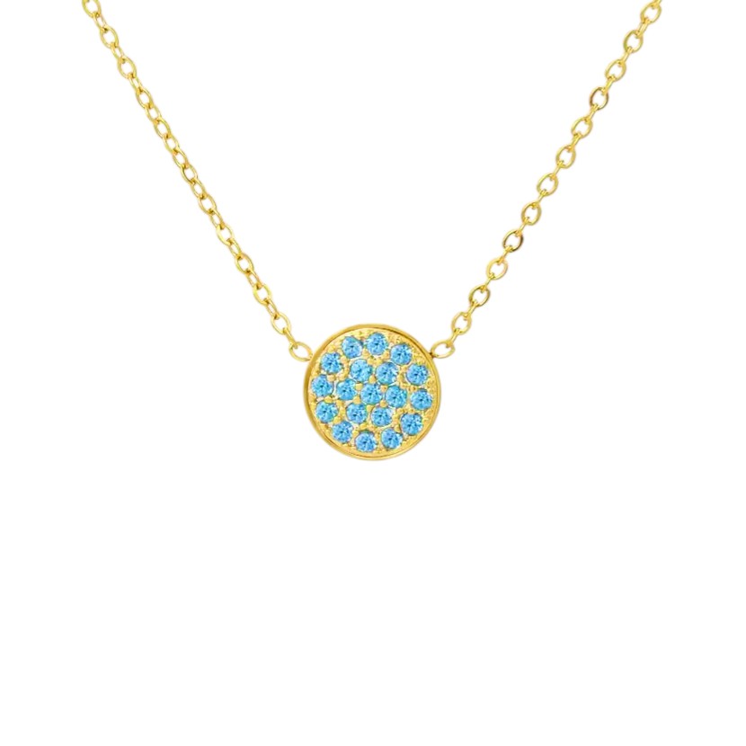 Gold necklace with a blue gemstone pendant on a white background