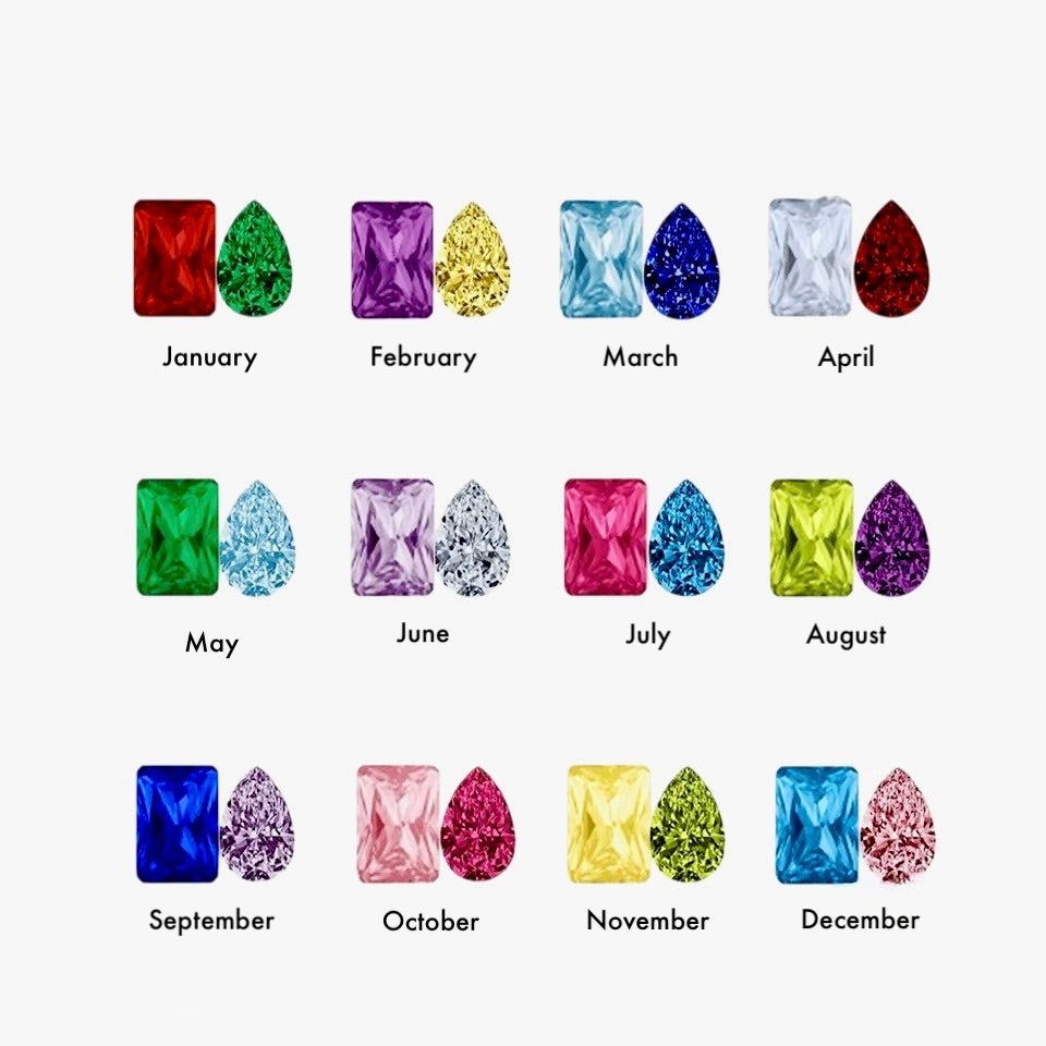 Colorful gemstones corresponding to each month of the year on a white background